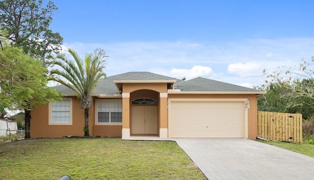 view of front facade featuring driveway, a garage, fence, and stucco siding