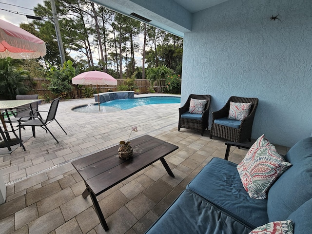 view of pool featuring a fenced in pool, a fenced backyard, a patio, and an outdoor hangout area