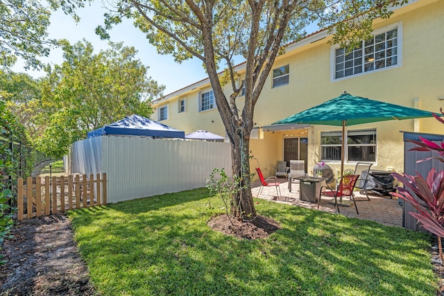 view of yard with a patio area and fence