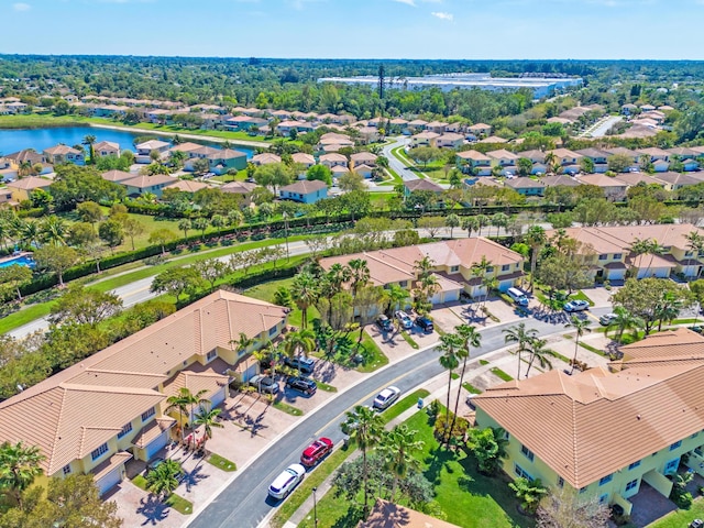 aerial view with a water view and a residential view