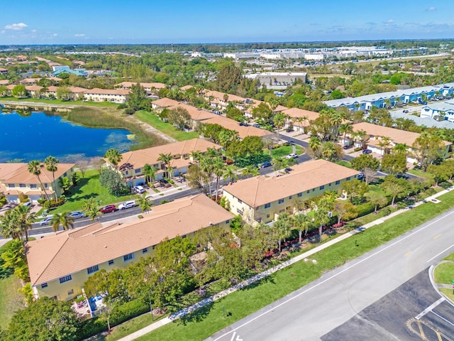 bird's eye view with a water view and a residential view