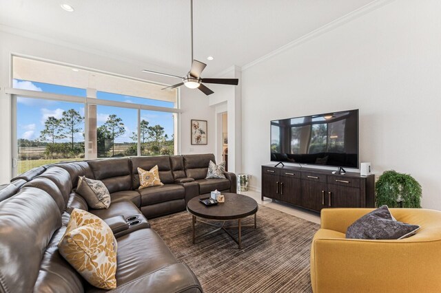 living room featuring a healthy amount of sunlight, ceiling fan, ornamental molding, and recessed lighting