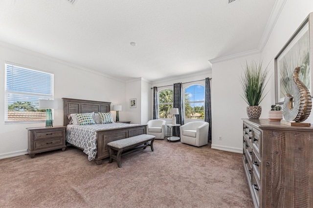 bedroom featuring baseboards, crown molding, and light colored carpet