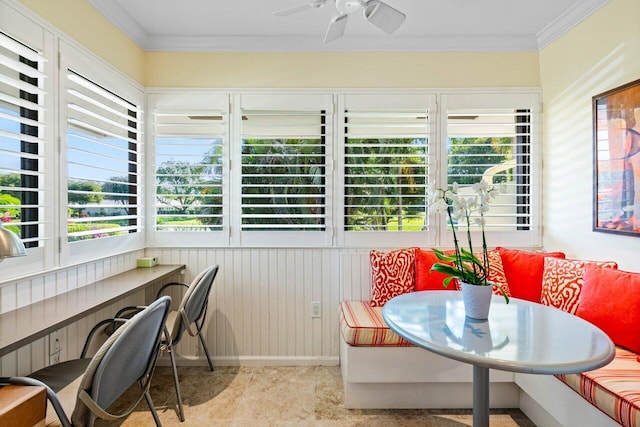 sunroom with a ceiling fan and a healthy amount of sunlight