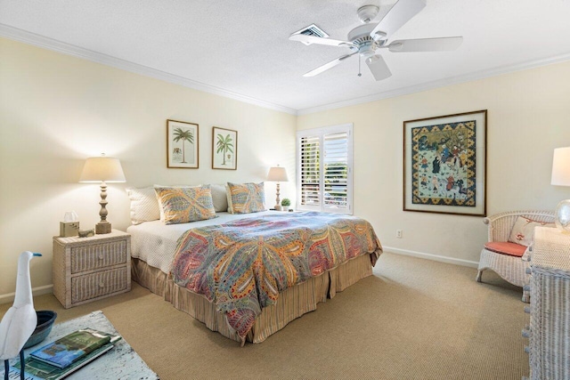 bedroom featuring baseboards, carpet flooring, visible vents, and crown molding