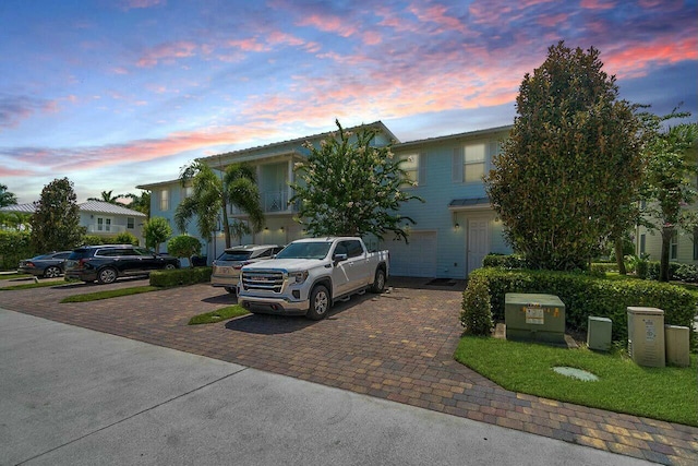 view of front of home featuring decorative driveway