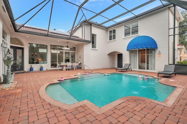 exterior space with a lanai, a patio, and ceiling fan