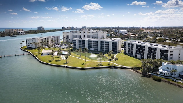 drone / aerial view with a water view and a view of city