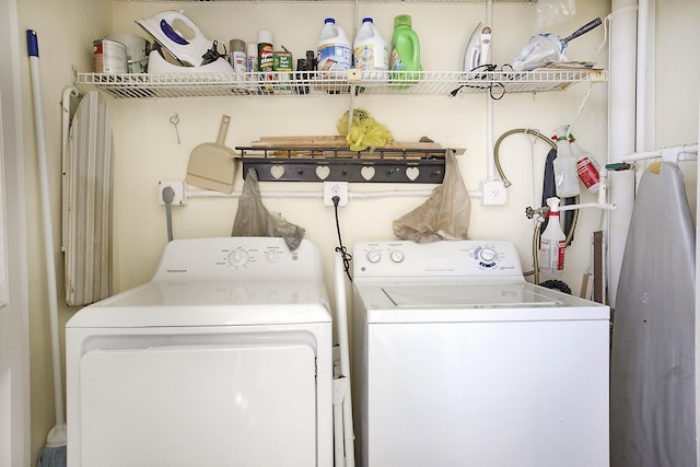 laundry area featuring laundry area and washing machine and dryer