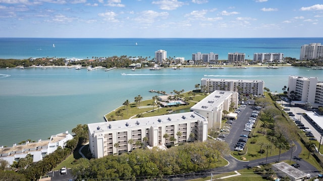 aerial view featuring a water view and a city view