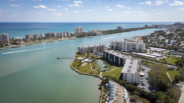 aerial view featuring a water view and a city view