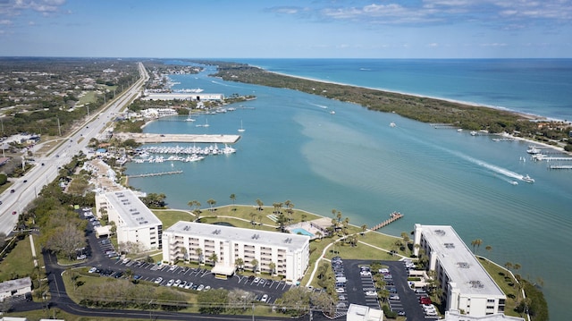 birds eye view of property featuring a water view