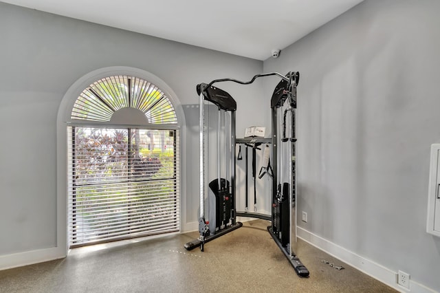 workout area with baseboards