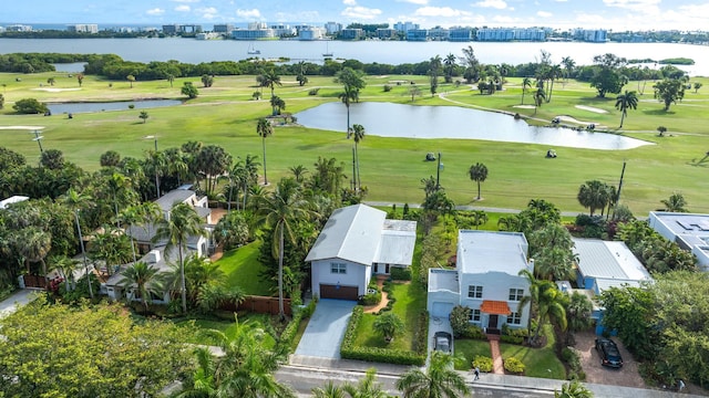 bird's eye view featuring view of golf course and a water view