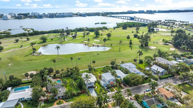 aerial view featuring a water view and golf course view