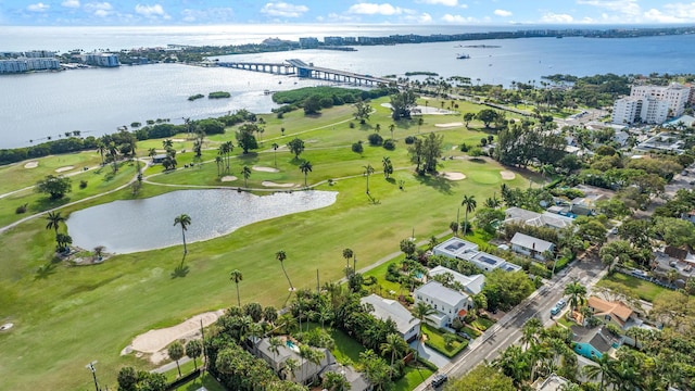 drone / aerial view featuring a water view and golf course view