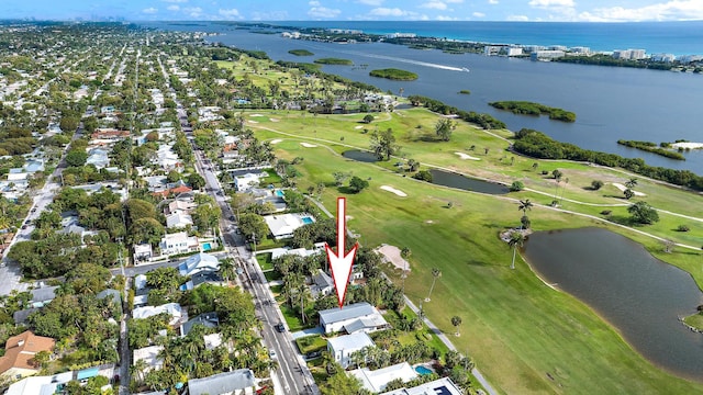 bird's eye view featuring a water view and golf course view