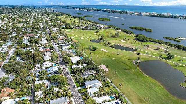 aerial view with a water view and view of golf course