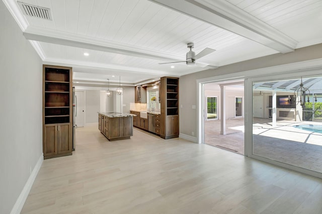 unfurnished living room with light wood-style floors, beam ceiling, visible vents, and baseboards