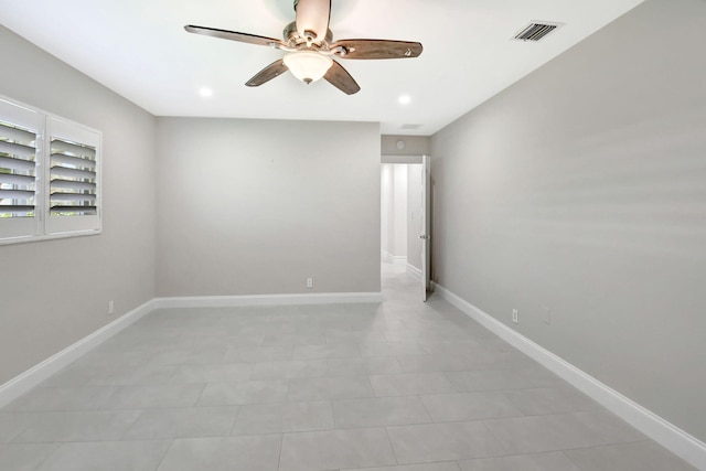 unfurnished room with baseboards, visible vents, a ceiling fan, and recessed lighting