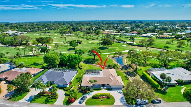 bird's eye view with golf course view and a residential view