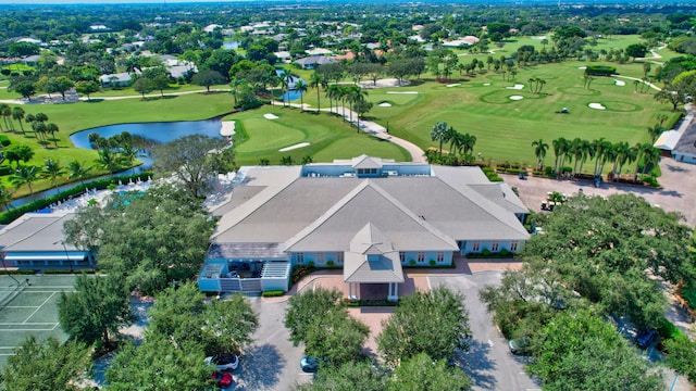 aerial view with a water view and golf course view