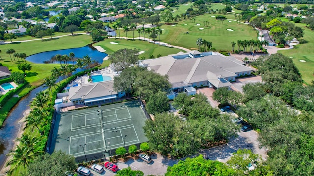 drone / aerial view featuring a water view and golf course view