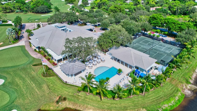 birds eye view of property with golf course view