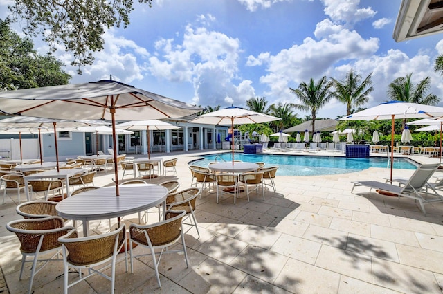 pool with a patio area