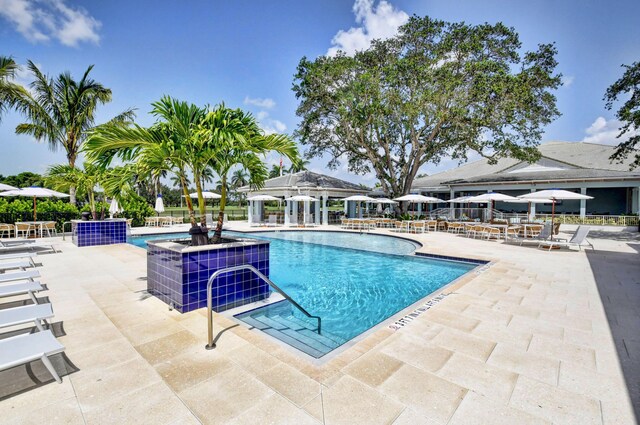 pool featuring a patio area