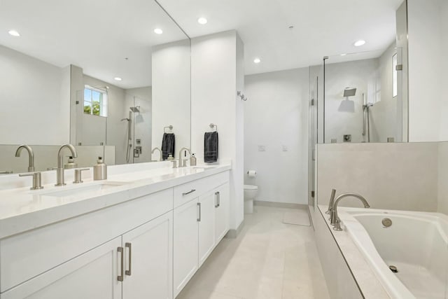 bathroom featuring toilet, a sink, a bath, and a shower stall