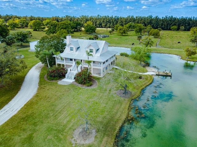 drone / aerial view featuring a water view