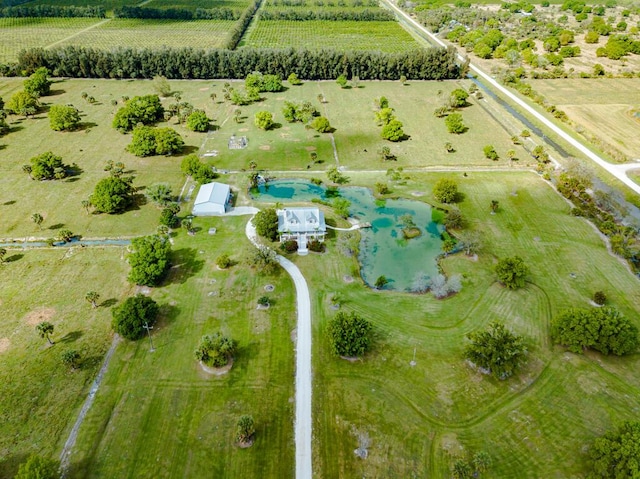 birds eye view of property featuring a rural view