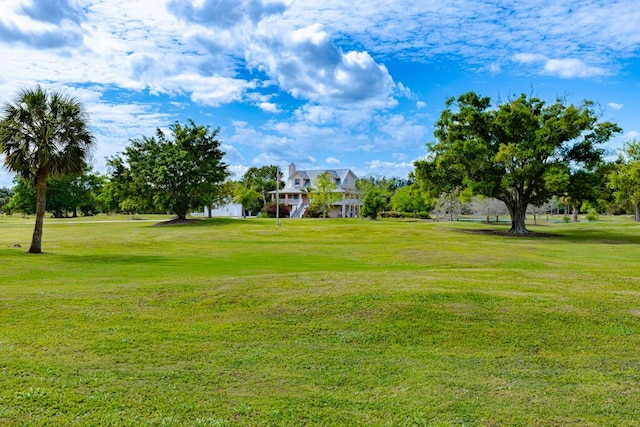 view of community with a lawn