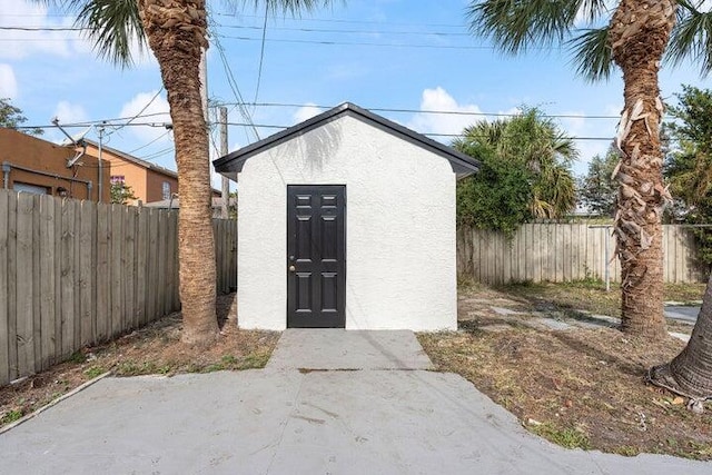 view of shed featuring a fenced backyard