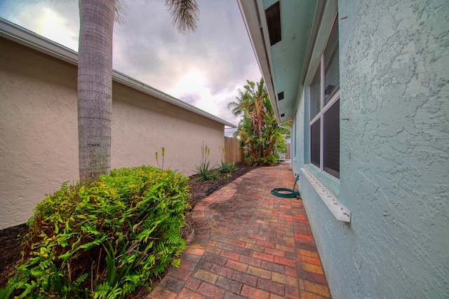 view of patio featuring fence