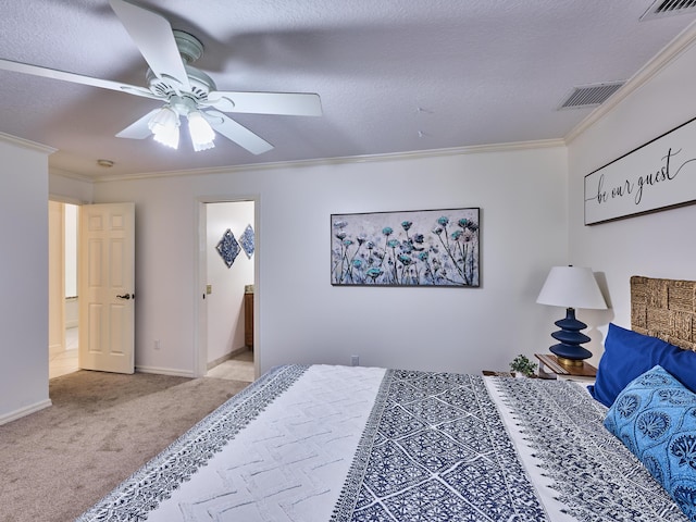 bedroom featuring ornamental molding, carpet flooring, visible vents, and baseboards