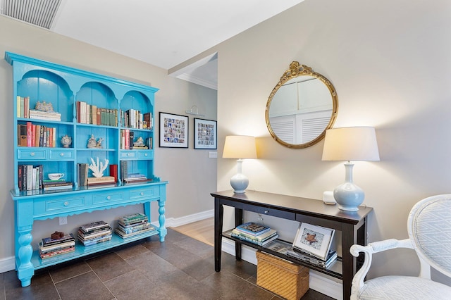 sitting room featuring baseboards and visible vents