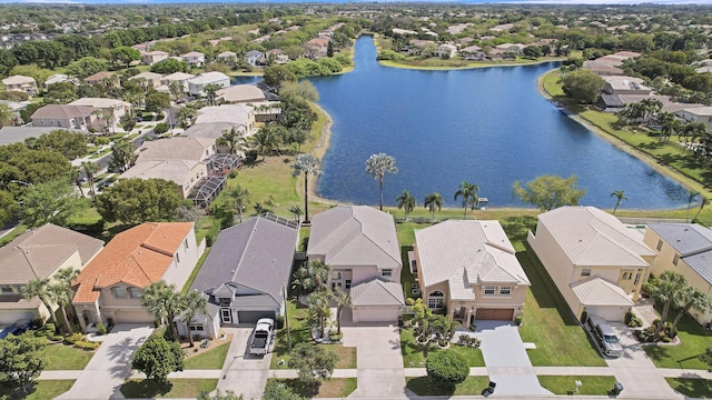 aerial view with a water view and a residential view