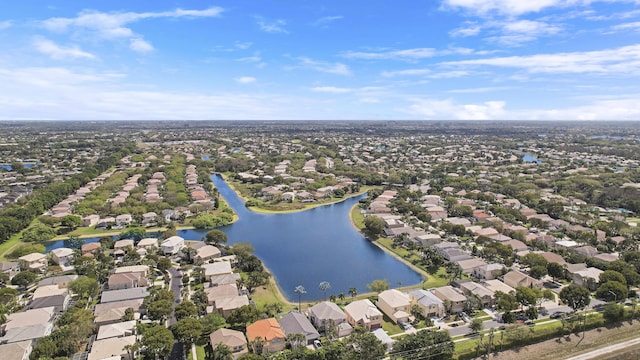 birds eye view of property featuring a residential view and a water view