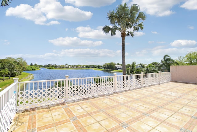 view of patio / terrace with a water view