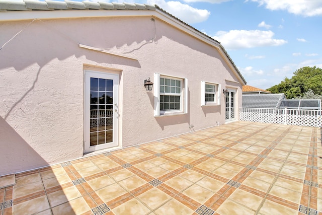 view of patio with fence