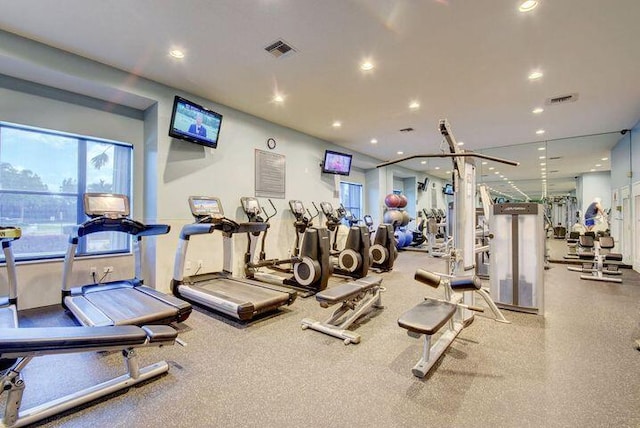 exercise room featuring visible vents and recessed lighting