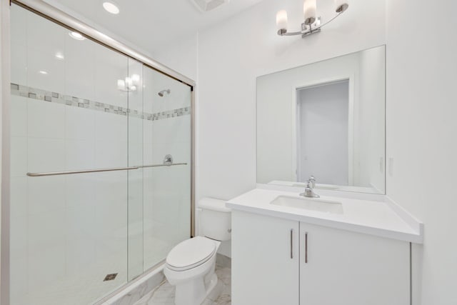 full bathroom with a stall shower, marble finish floor, vanity, and toilet