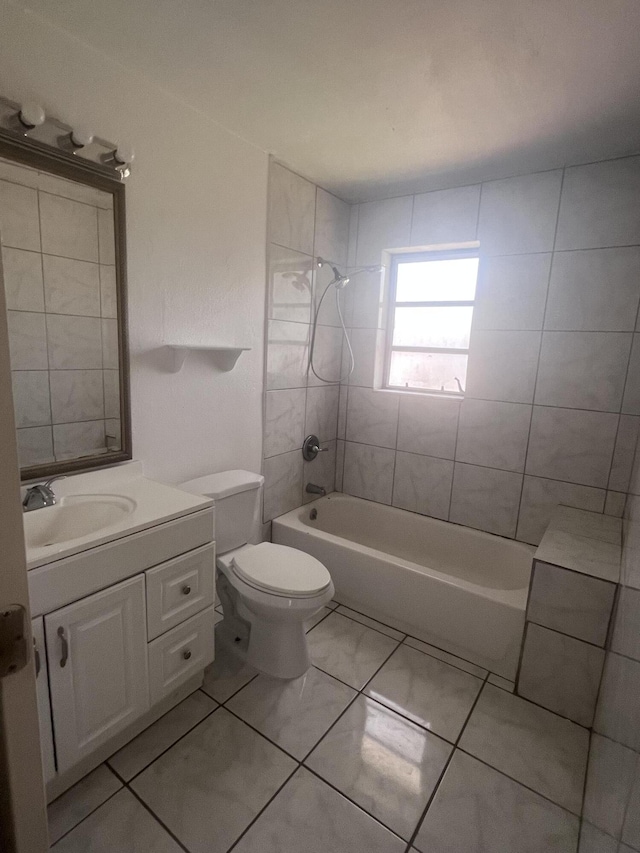 full bath featuring shower / bathtub combination, toilet, and vanity