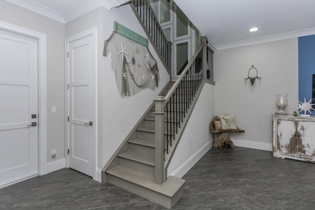 stairs with ornamental molding, recessed lighting, baseboards, and wood finished floors