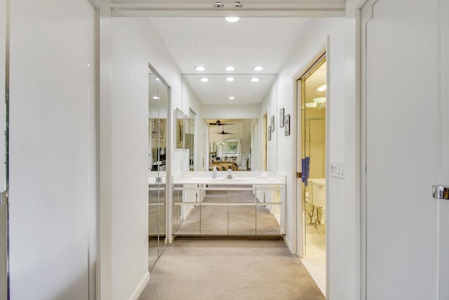 full bathroom with ensuite bath, ceiling fan, a textured ceiling, vanity, and recessed lighting