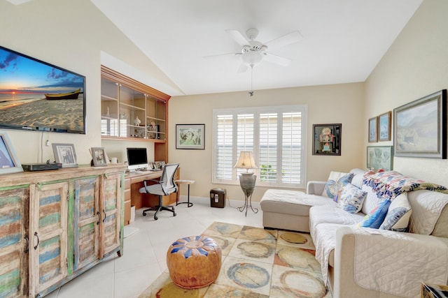 office with lofted ceiling, ceiling fan, baseboards, and tile patterned floors