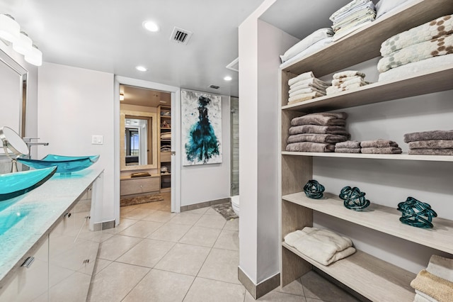 full bath featuring visible vents, tile patterned flooring, walk in shower, vanity, and recessed lighting