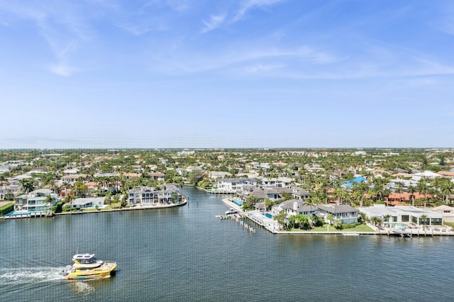 aerial view featuring a water view and a residential view